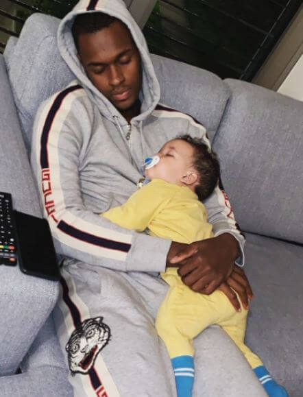 Edimilson Fernandes sleeping with his son.